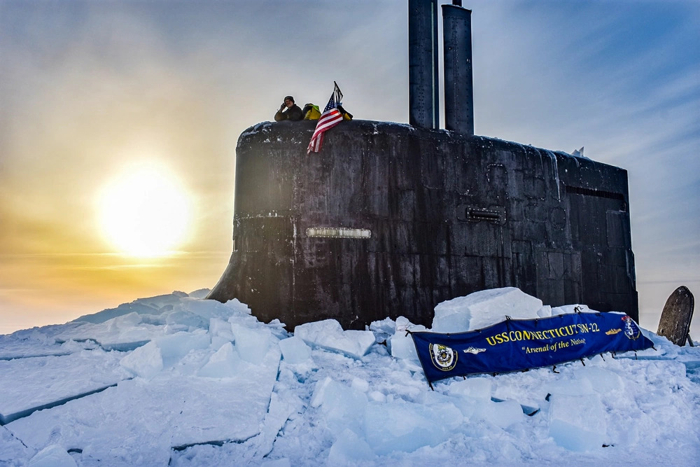 USS Hampton breaking through Arctic ice during ICEX campaign